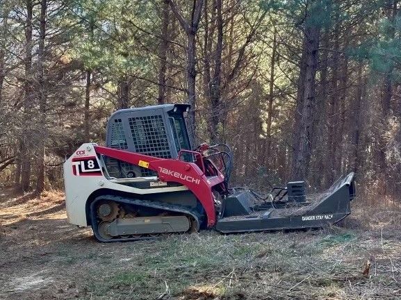 Professional land grading contractor at work