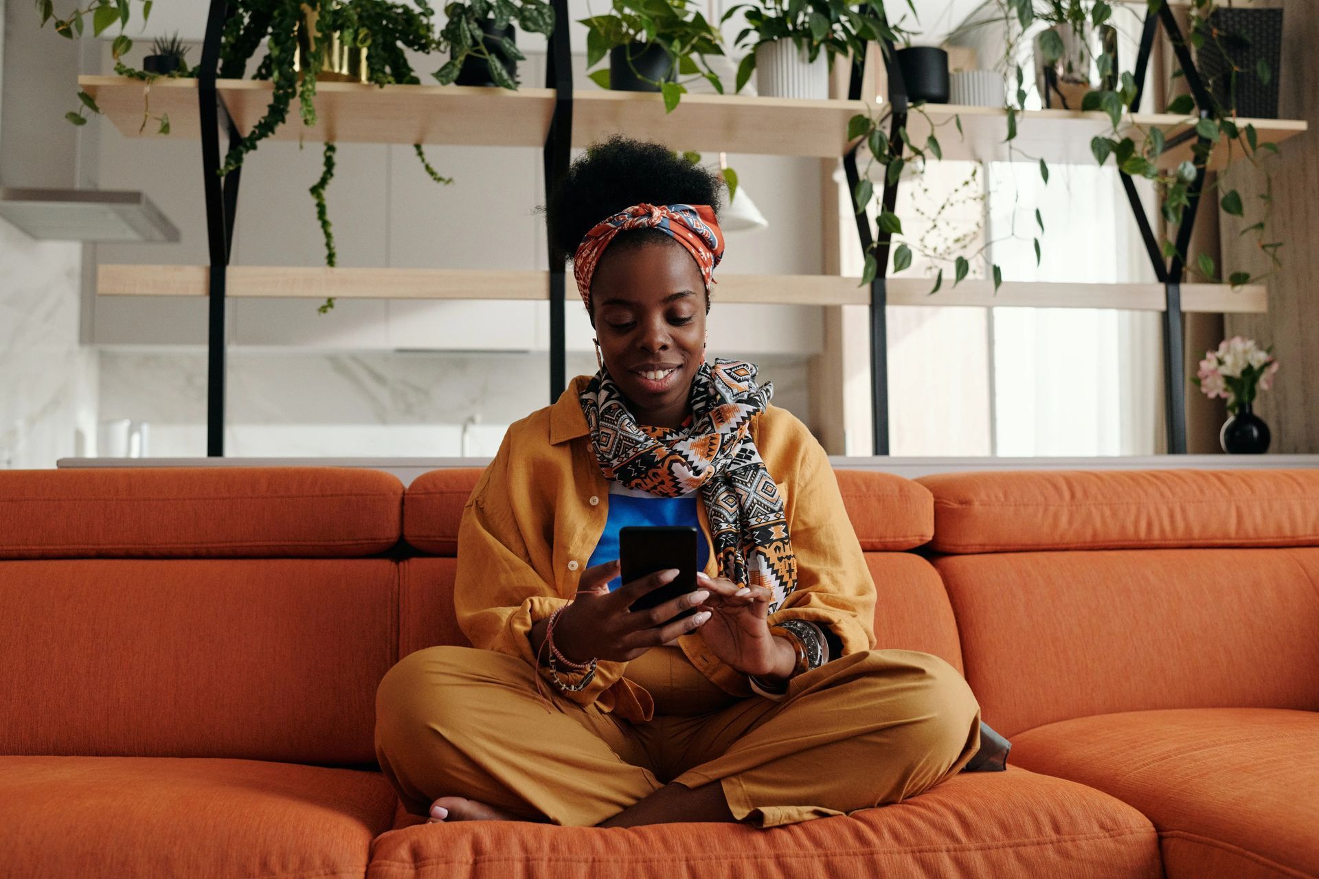 Woman Sitting on Couch