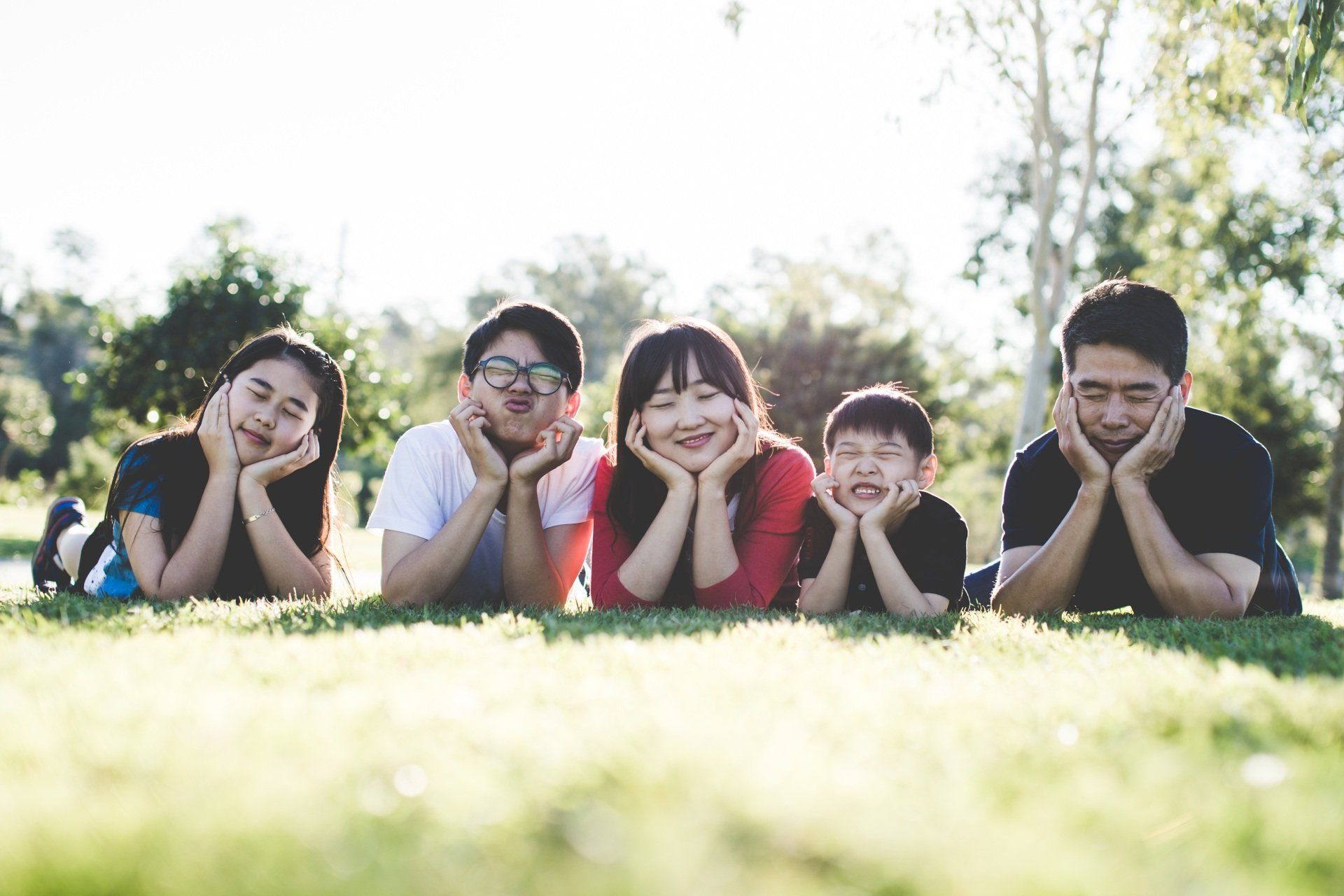 People Posing on Grass 