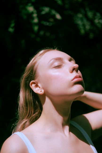 Young woman with healthy skin exploring preventive anti-aging in Seoul