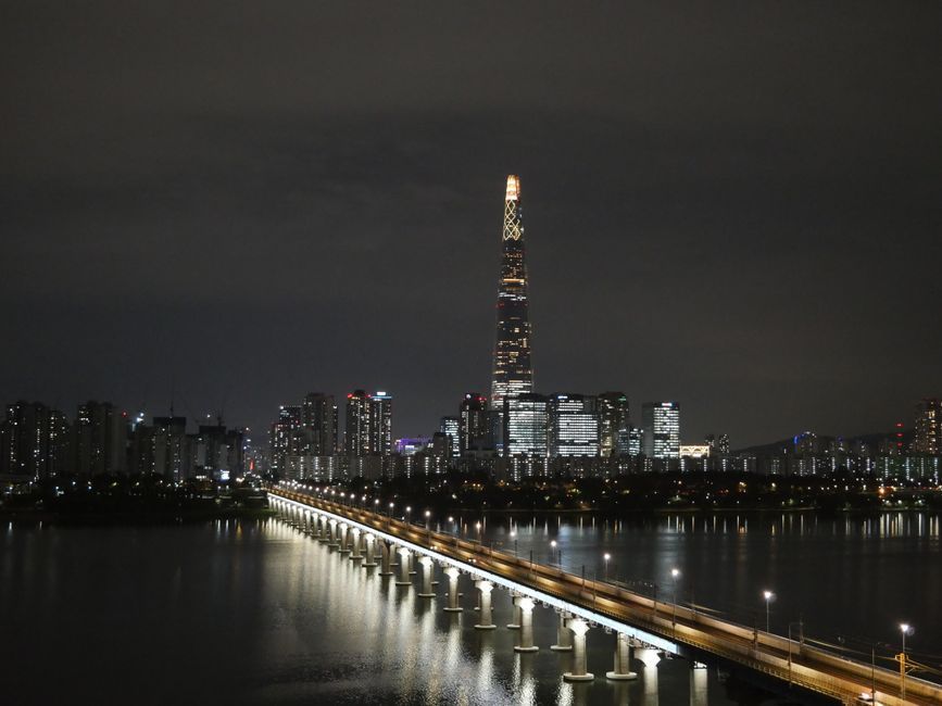 Lotte World Tower skyline near The Heal, a Jamsil dermatology clinic in Seoul