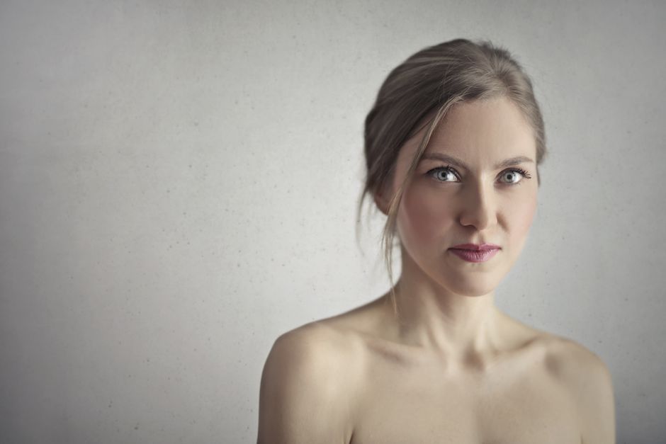 Woman considering filler dissolving treatment in Seoul