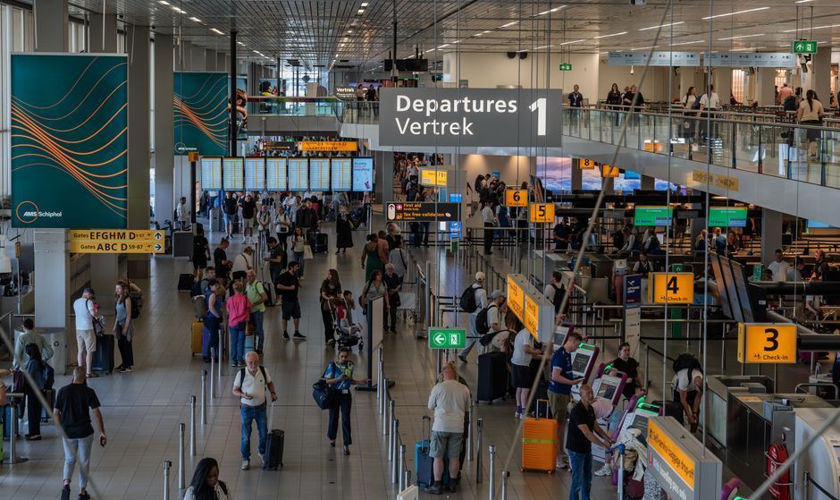 Traveler checking tax refund rules at Incheon Airport after treatment in Seoul