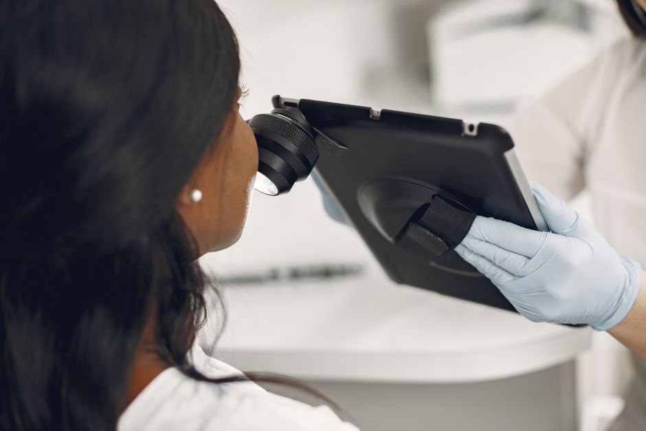 Dermatologist assessing a mole before removal at The Heal Dermatology in Jamsil, Seoul