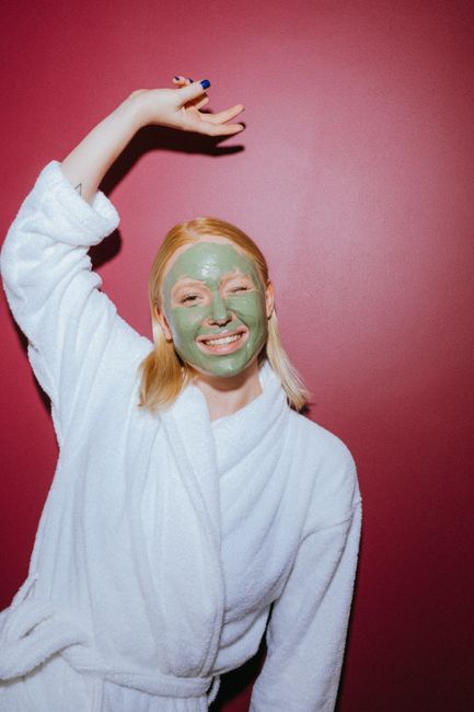 Woman with rosacea-prone skin applying gentle skincare in Seoul