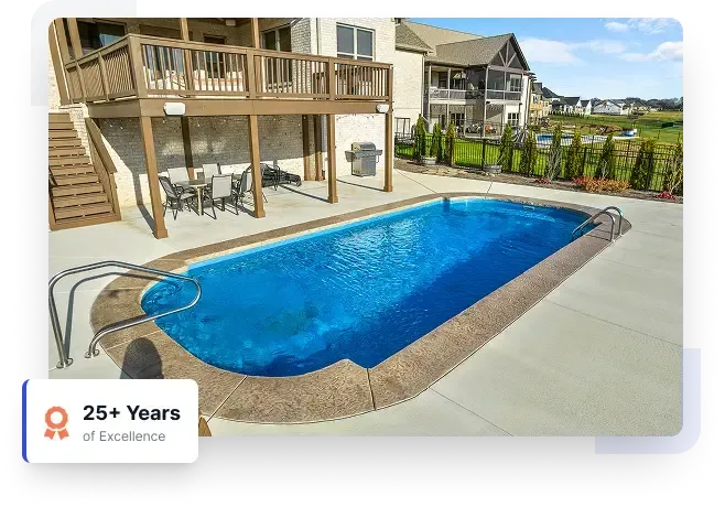 Backyard with a blue in-ground pool beside a wooden deck and patio chairs under a house