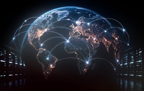 Glowing digital globe with network connections over a dark futuristic background
