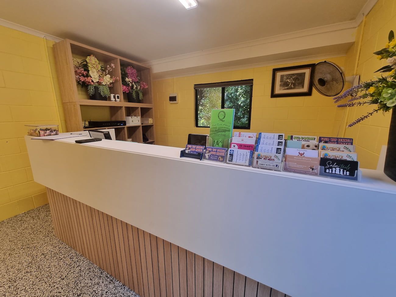 Reception Desk in a Room With Yellow Walls — 4 Way Kennels & Canine Wellness Centre in Kinkuna, QLD