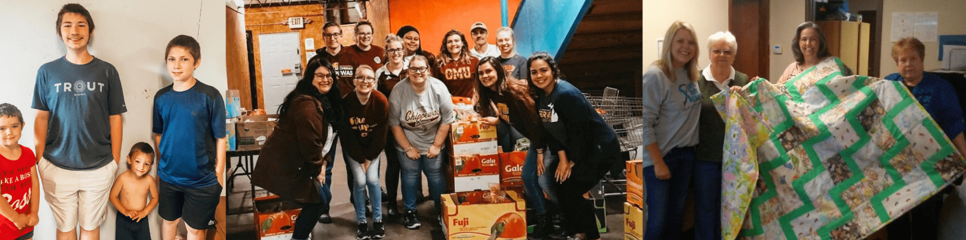 Group of people posing indoors with bags, bottles, and quilts in front of a colorful mural