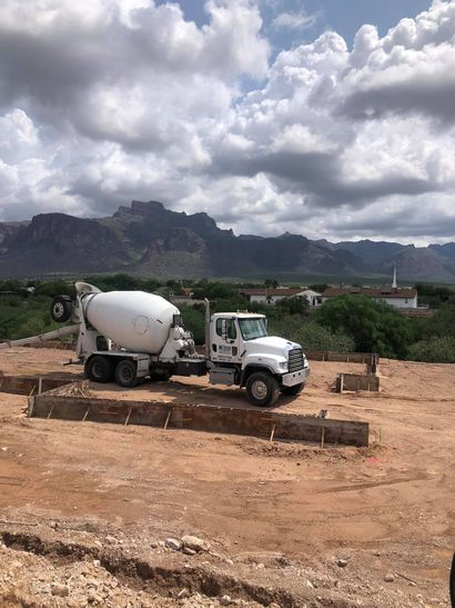 Pumpable concrete with aggregate grout being placed at a commercial project site in Mesa, Arizona