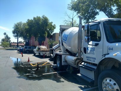 Ready mix concrete delivery truck serving a residential driveway project in Mesa, AZ