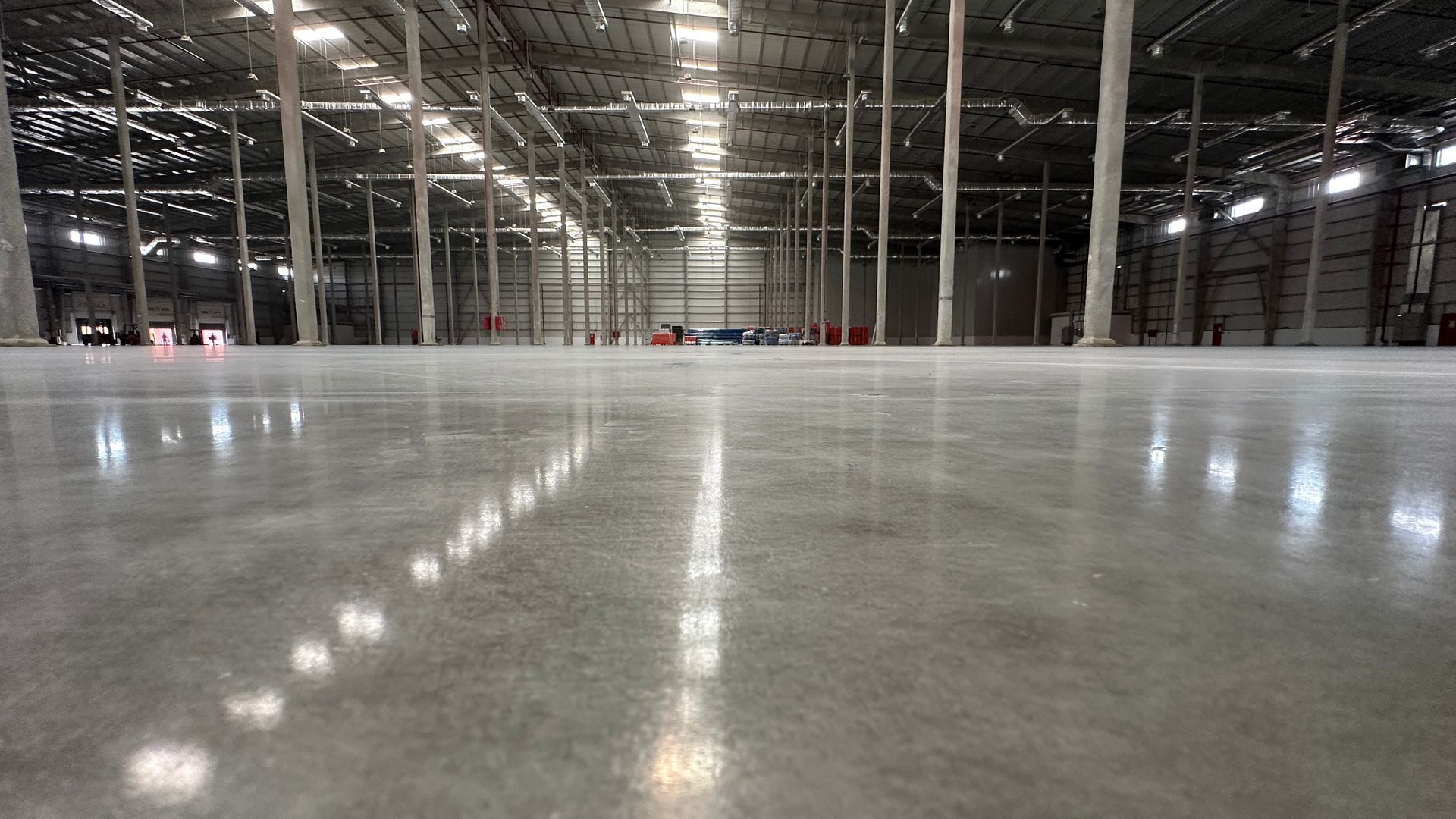 Large commercial warehouse floor with smooth troweled concrete surface, Queen Creek, AZ East Valley