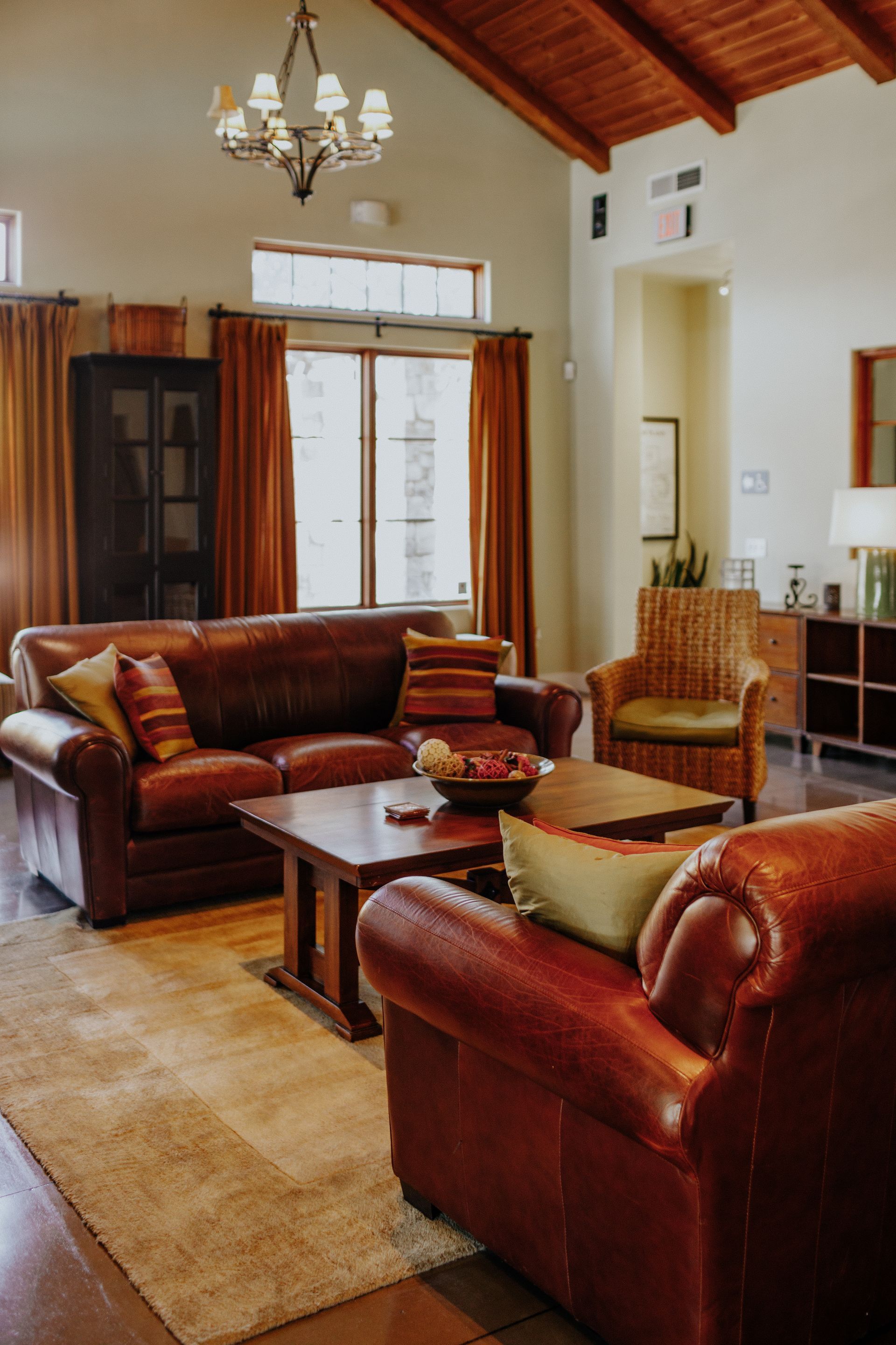 A living room filled with furniture and a chandelier