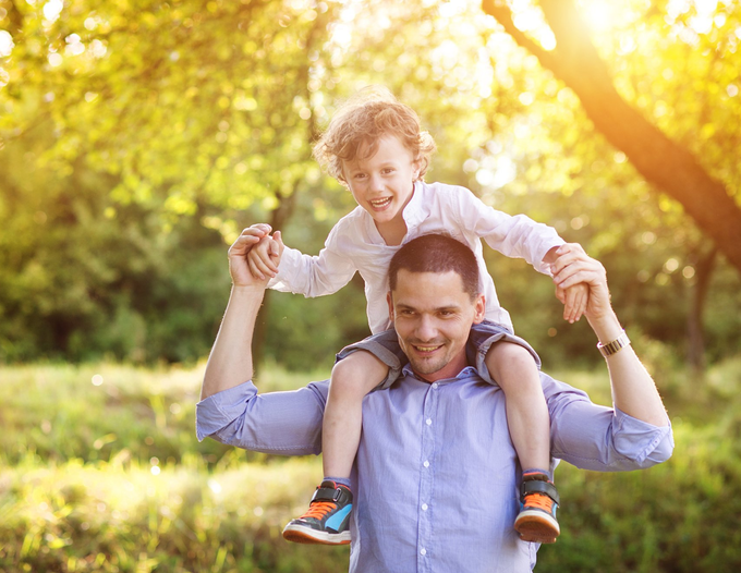 father and child playing image