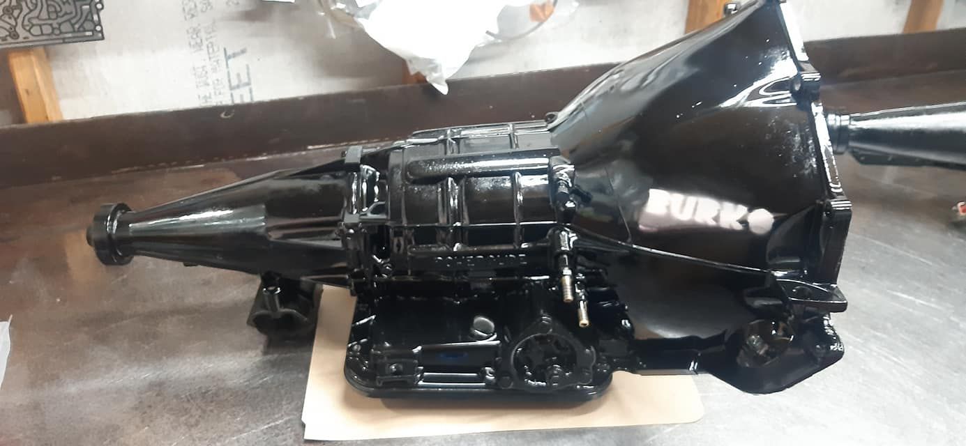 A Black Gearbox is Sitting on a Piece of Cardboard on a Table — Burko Transmissions in Benalla, VIC