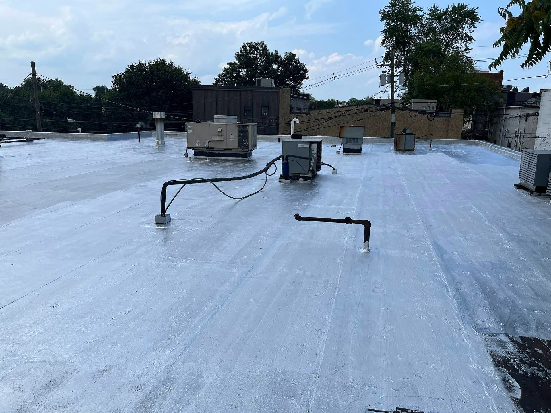 A roof with a lot of pipes on it