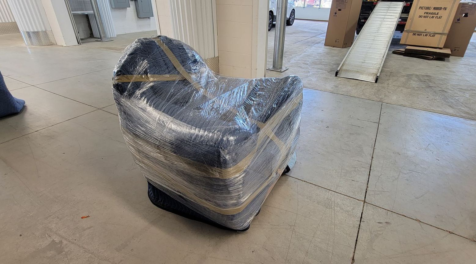 packed sofa ready for moving