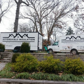 Two white trucks branded 