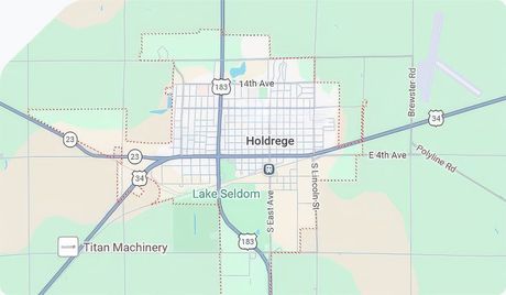 Map of Holdrege with roads, highways, and nearby landmarks in a pale green rural area