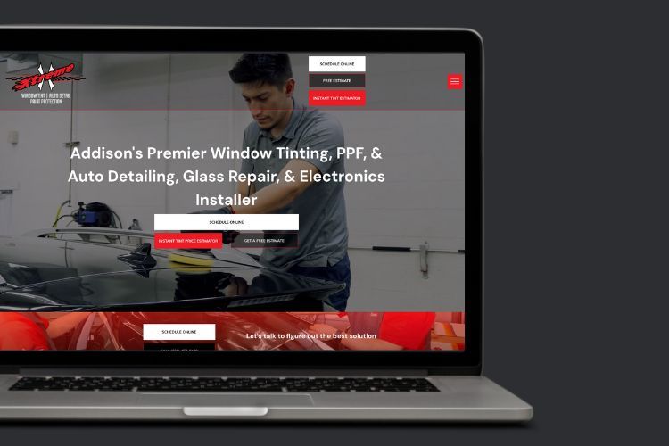 a laptop screen shows a man polishing a car .
