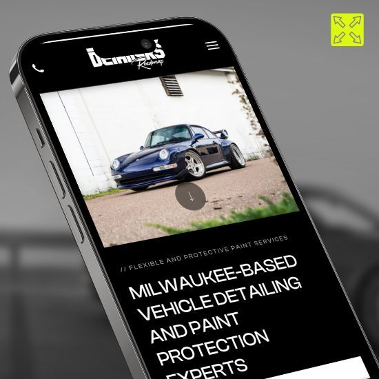 A phone with a picture of a car on the screen