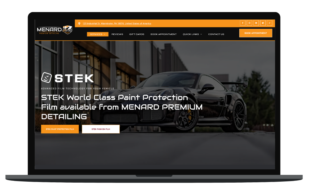 a laptop screen shows a man polishing a car .
