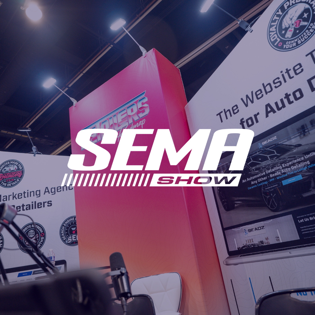 The logo for sema show is on a red sign