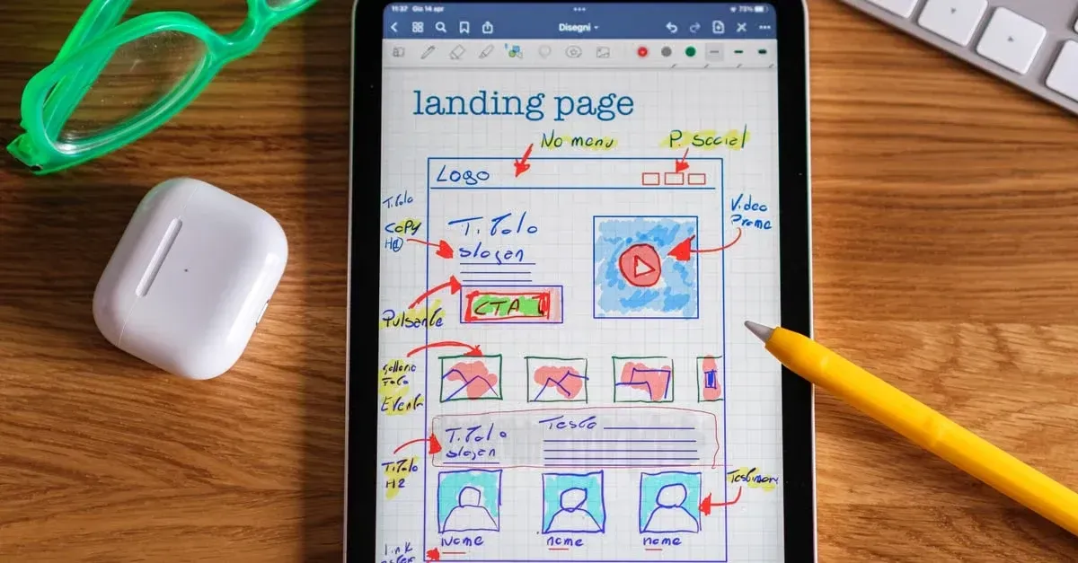 Tablet displaying hand-drawn landing page wireframe for automotive web design with sketched layout, logo, and navigation.