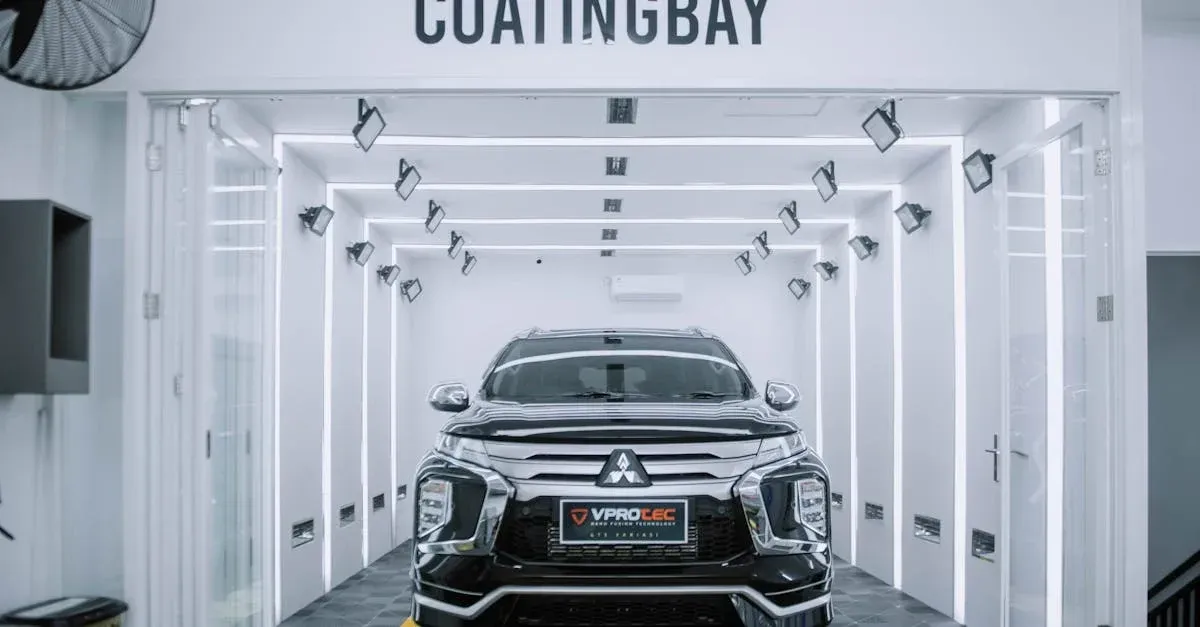 Black Mitsubishi in modern coating bay facility showcasing professional auto detailing marketing agency services.