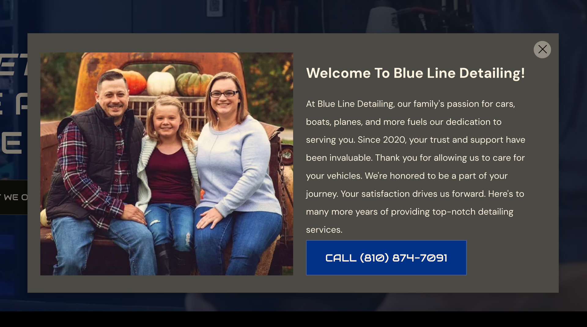 Family in front of truck; message welcomes to Blue Line Detailing, with call button.