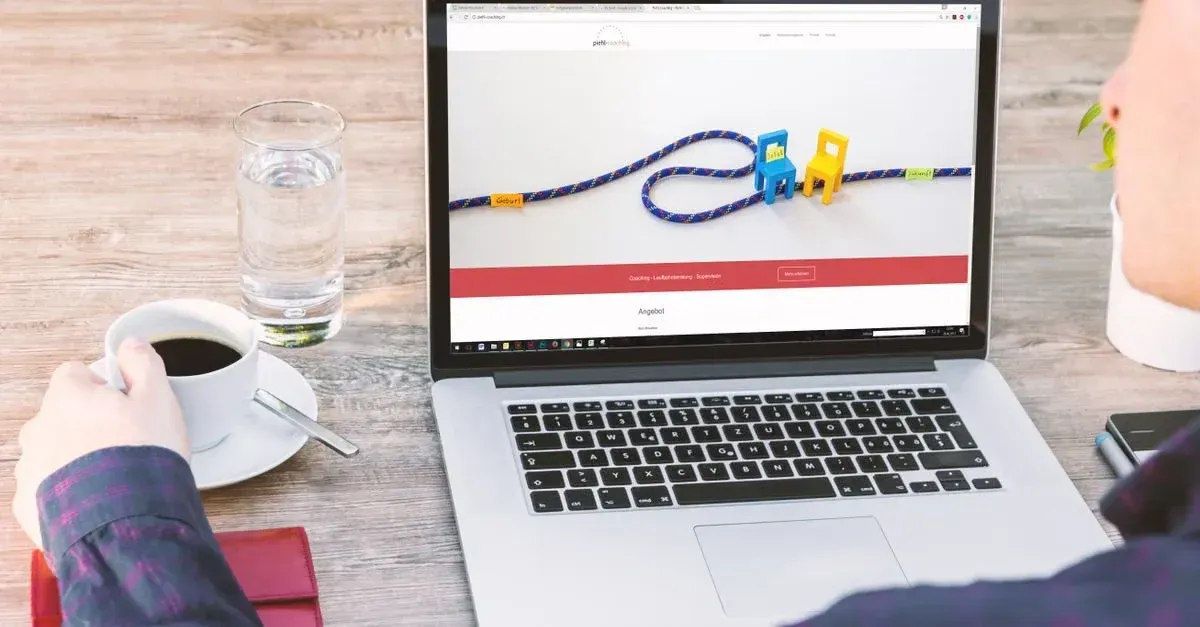 Laptop displaying colorful website builder interface with rope elements, ideal for best website builder auto detailing.