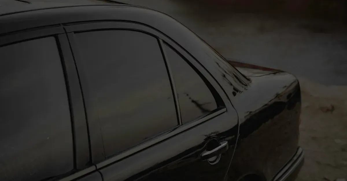Dark vehicle with tinted windows showcasing window tint advertising potential and professional installation quality.
