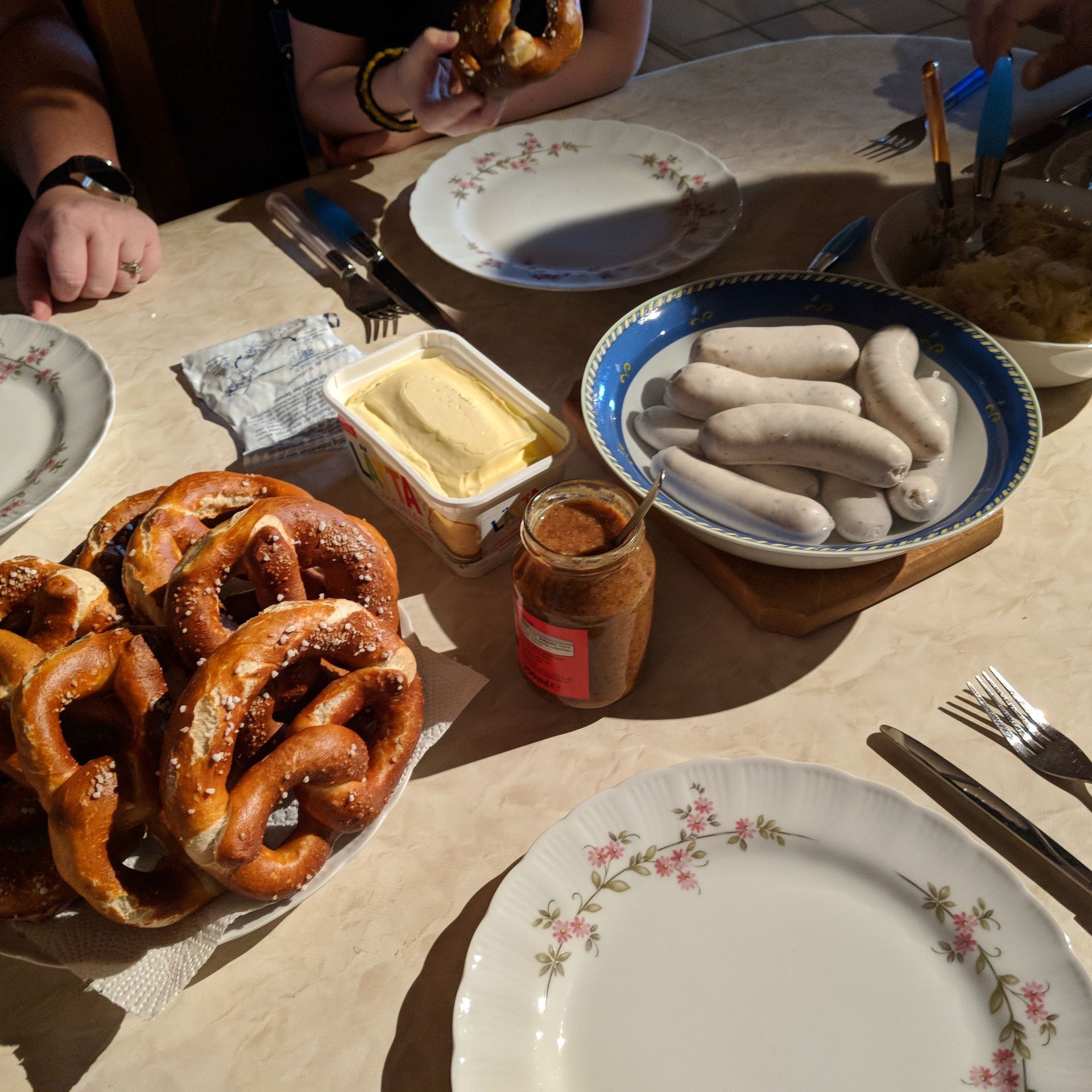 a table set with german breakfast items