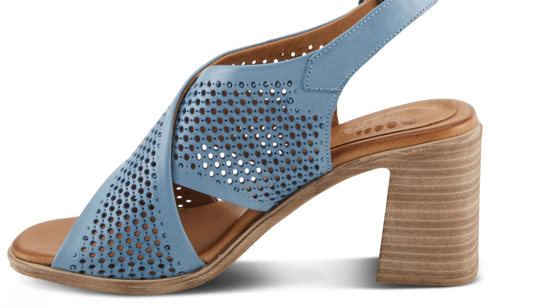 A pair of blue sandals with a brown heel on a white background