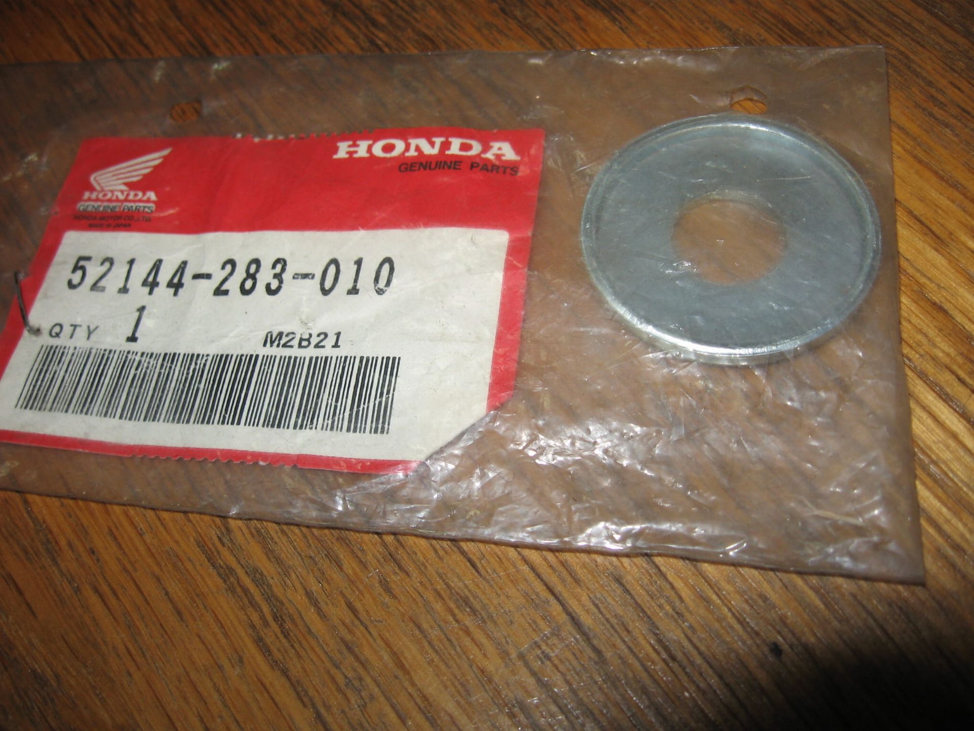 stofring achterbrug cb350f cb450k , cb500		oem	52144-283-010