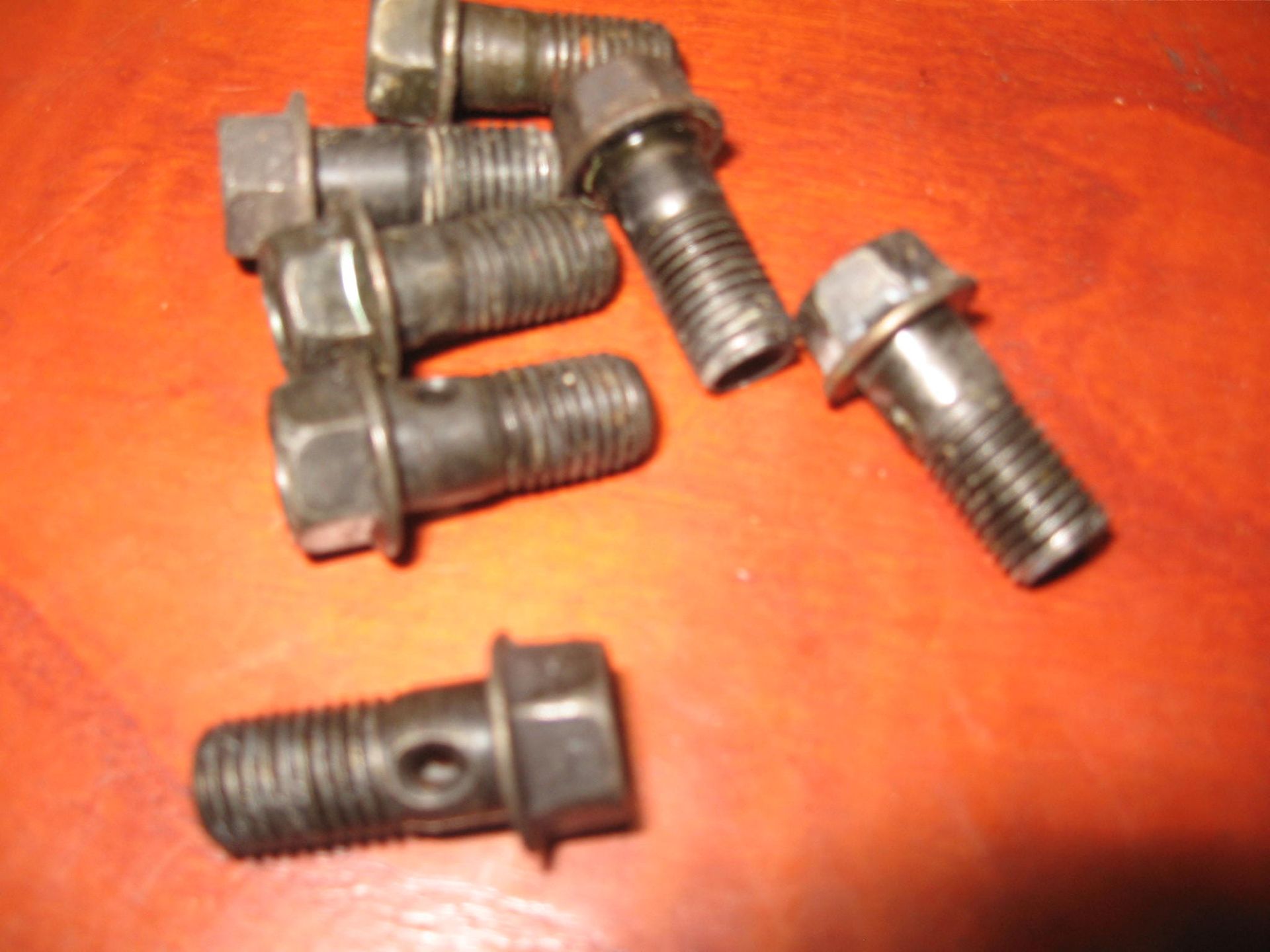 3x banjobout donker , m10x1,25 sleutelmaat 12	Gebruikt , (2)