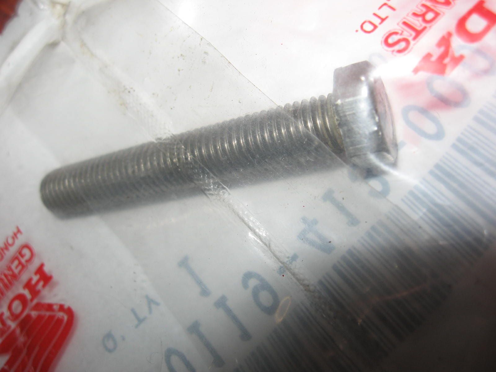 2x bout kettingspanner M7x43 , kop 10mm - cb400 cm400 cm450 cb450		oem		90119-413-000