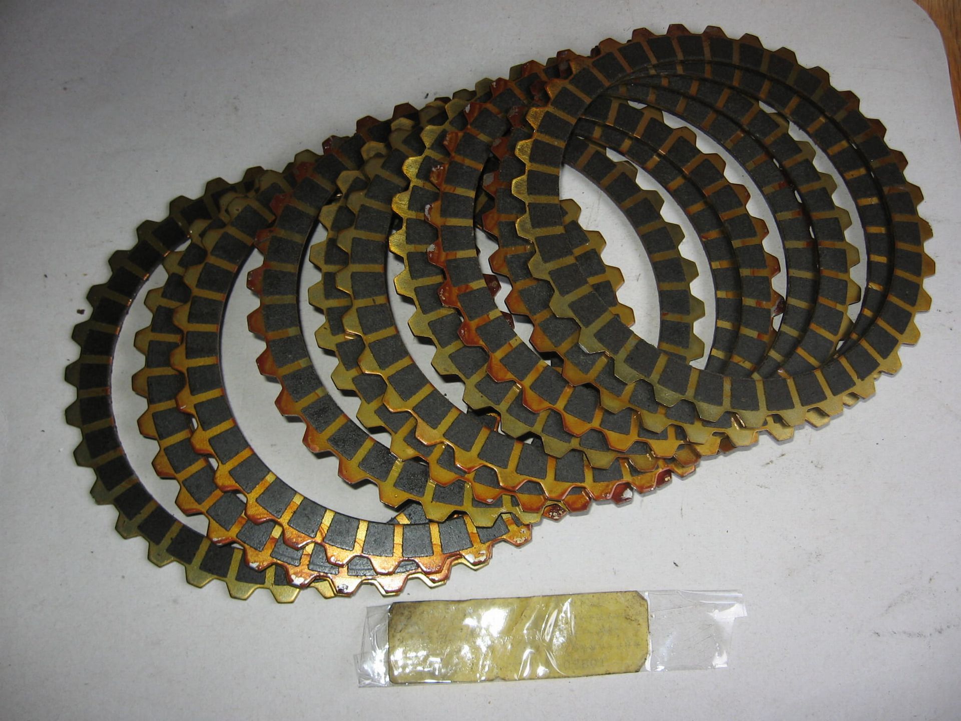 11 stuks ( set) koppelingsplaat gevoerd -gsxr1100 1986-88 , 91-93 	,oem		21441-06B01