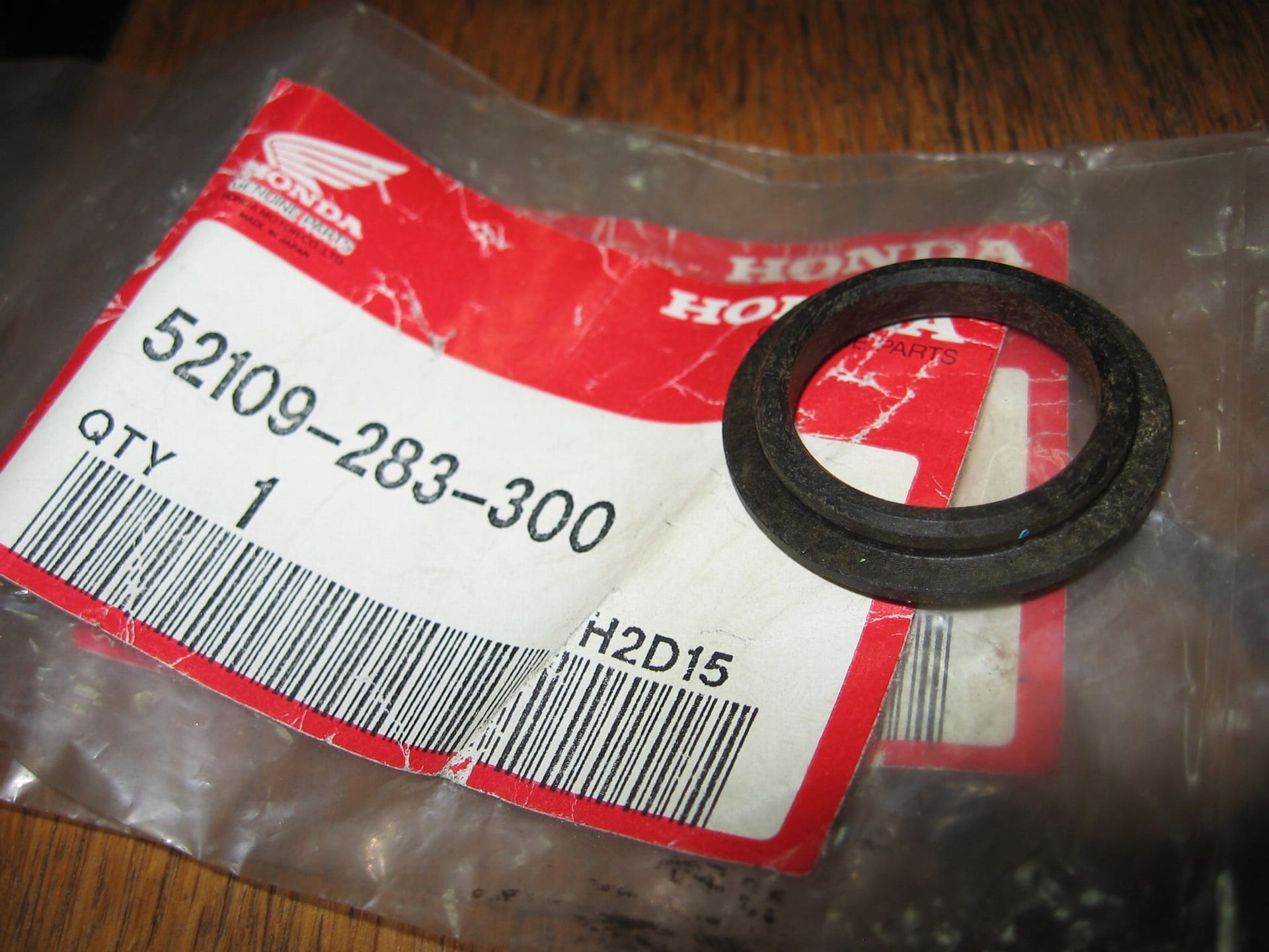 2x thrust bush, kunstof drukbus achterbrug ,cb350f , cb450k , cb500,cb550 		oem	52109-283-300