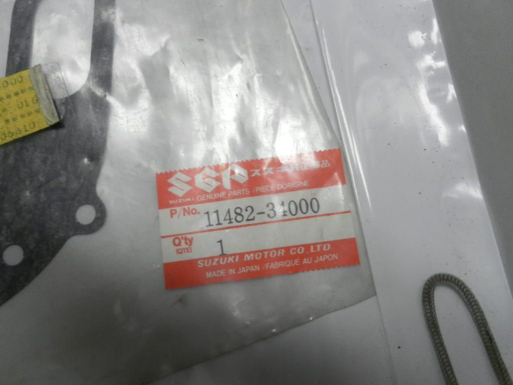 Pakking , koppelingsdeksel GT550		oem	11482-34000
