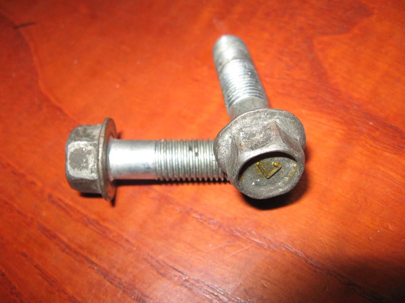 2x flensbout m10x40x1,25 remklauw	gs gn , 01517-10408