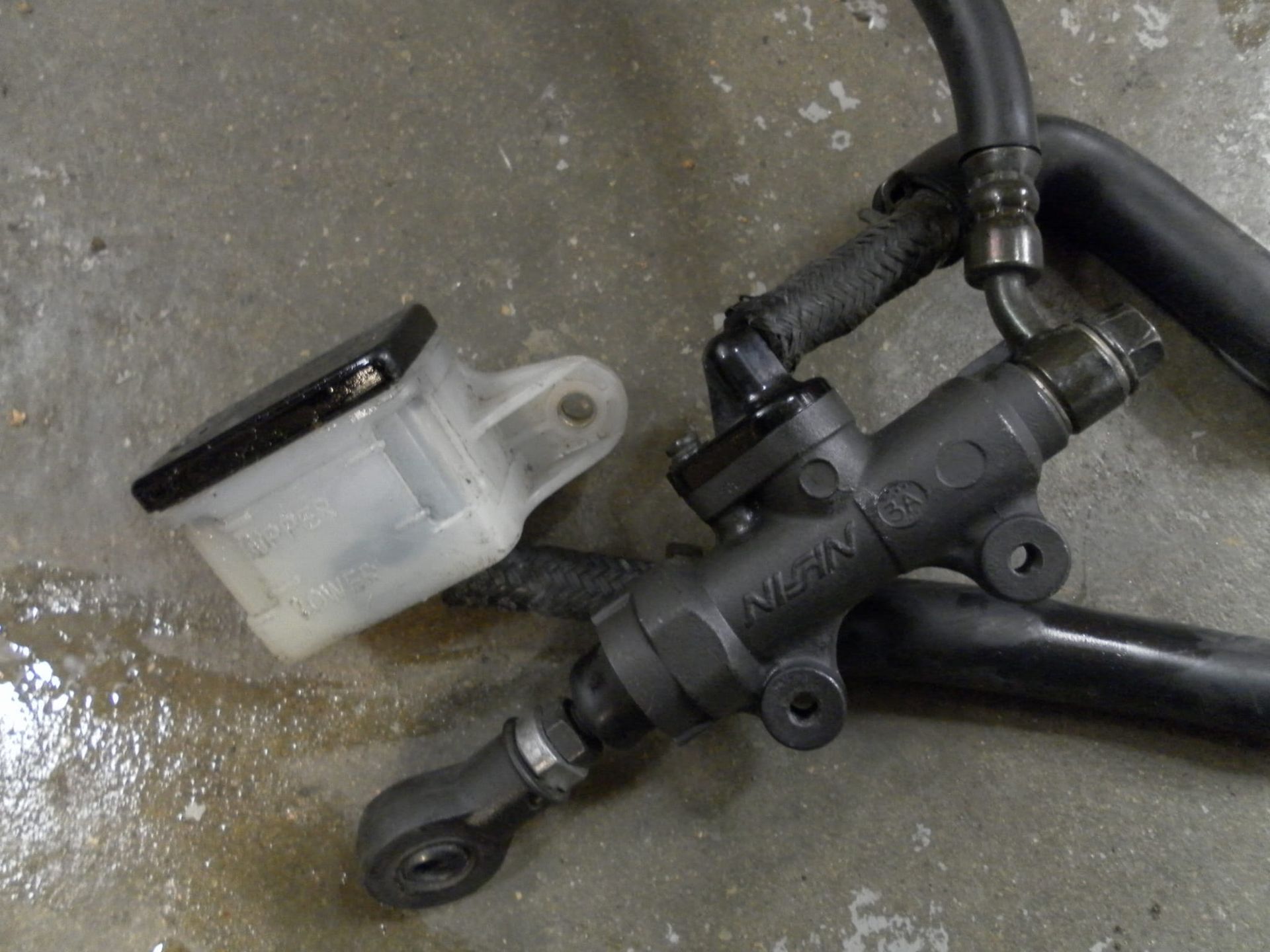 nissin achterrempomp + remolie reservoir	Cbr600rr 03-04 	43510-MEE-006   ,  43511-KV3-831	43510-MEE-016