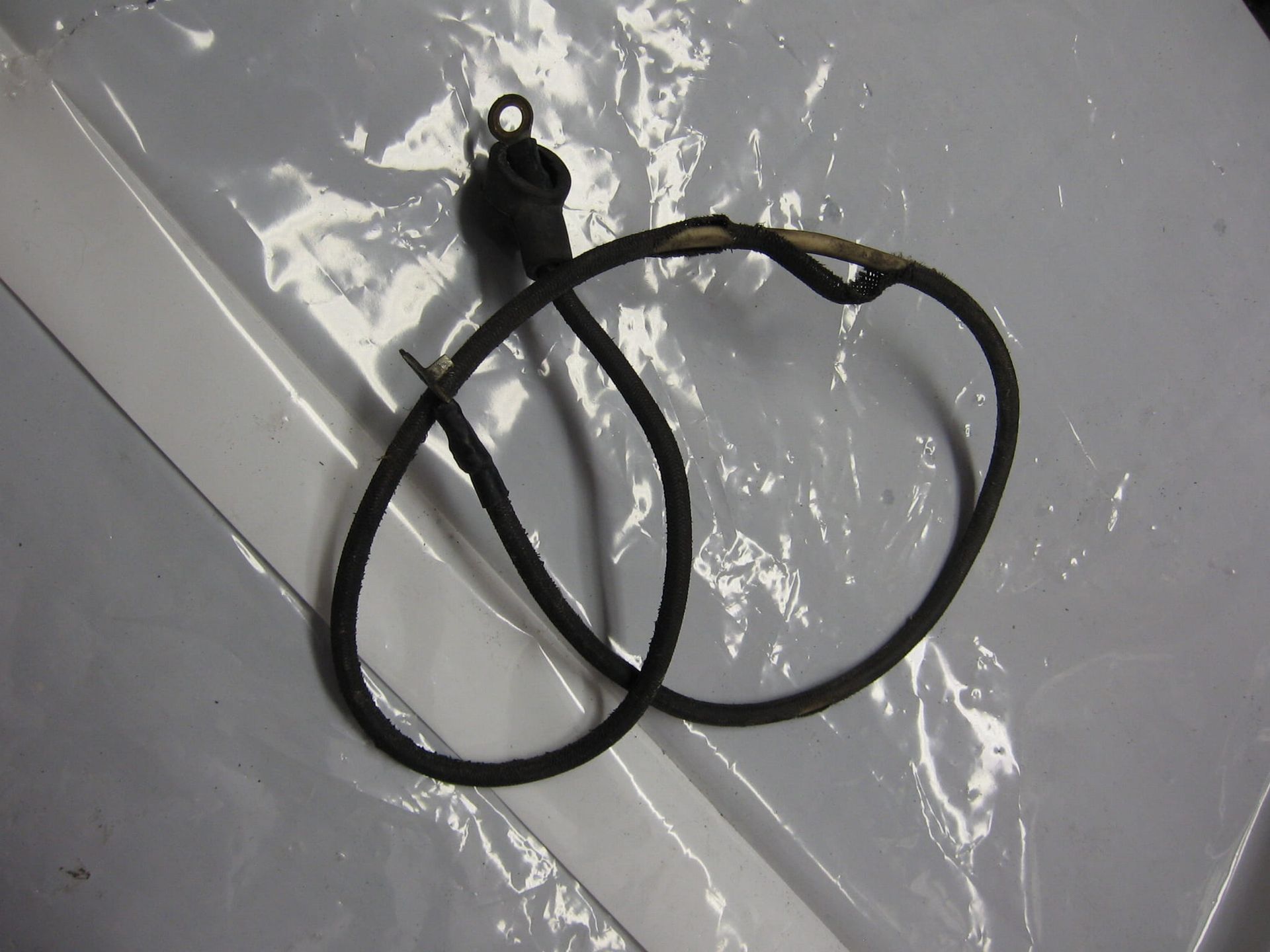 kabel aan startmotor , beschadiging canvas omhulsedl	gs1150