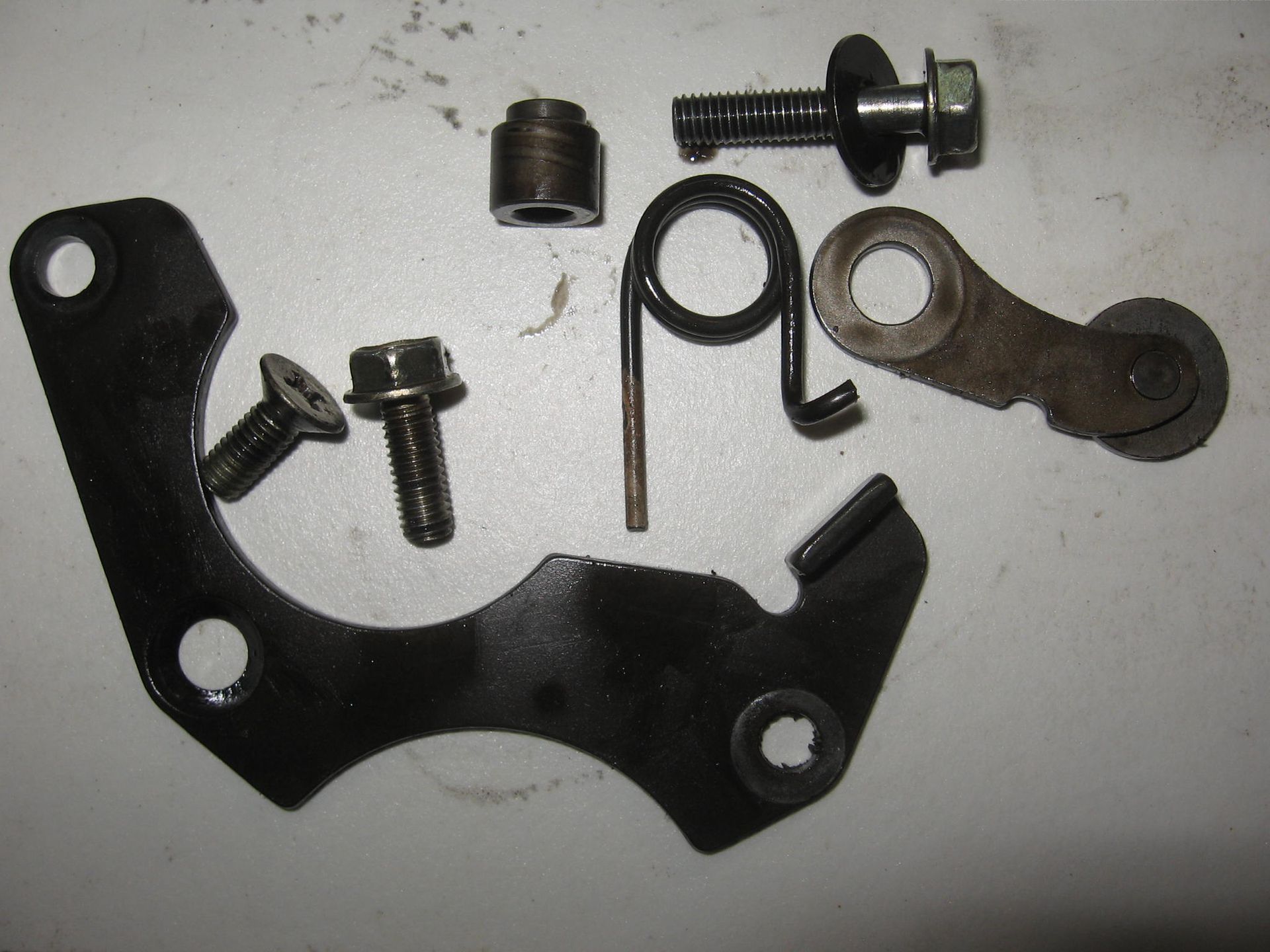 stopplaat schakelwals + stop arm schakelwals ( shift drum stopper , drum stopper plate) // cmx450c 86		24231-ml4-610 + 24430-ml4-610
