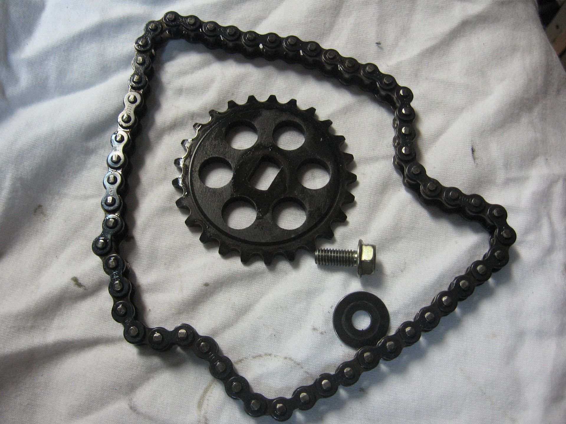 oliepomptandwiel ketting , ring, boutje -- vt700 c 1984		15134-mb0-000 / 15161-me5-003 / 90487-mb0-000 / 957010601408