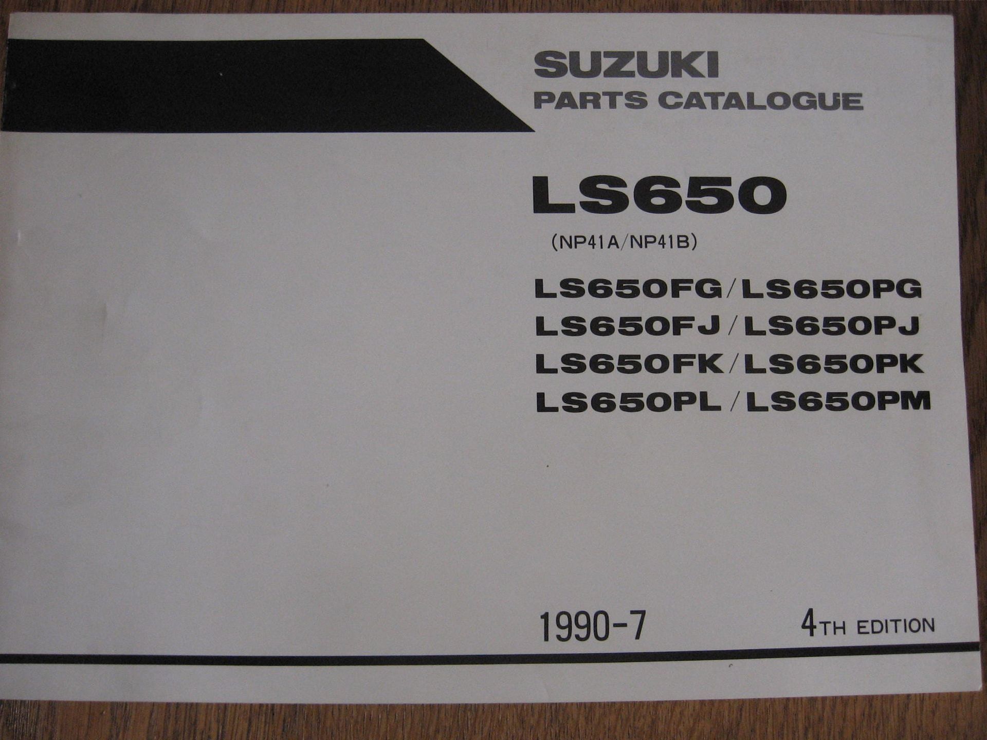 Suzuki origineel parts catalog / manual  uit 1990-7 4e editie 	LS650 FG,OPG,FJ,OPJ,FK,OPK,PL,OPM  1987-91, NP41A/NP41B , 	9900 B-30061-030