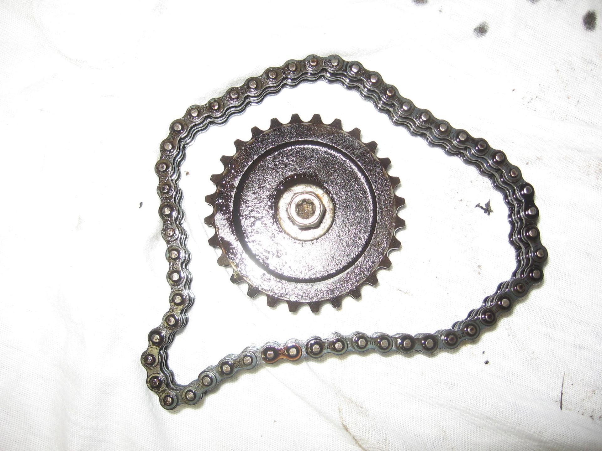 oliepomp kettingwiel + ketting // Gl1000 gl1100		15116-371-003 + 15130-371-003