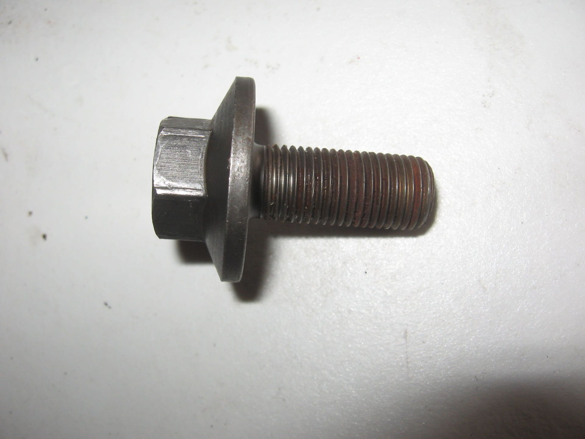 flensbout pulse rotor M12x1,25x28 flens 31mm sleutelmaat 17  	Vt600c 1988-2007 , xl600v 1997-99 , ntv600 1988-91	90013-415-000