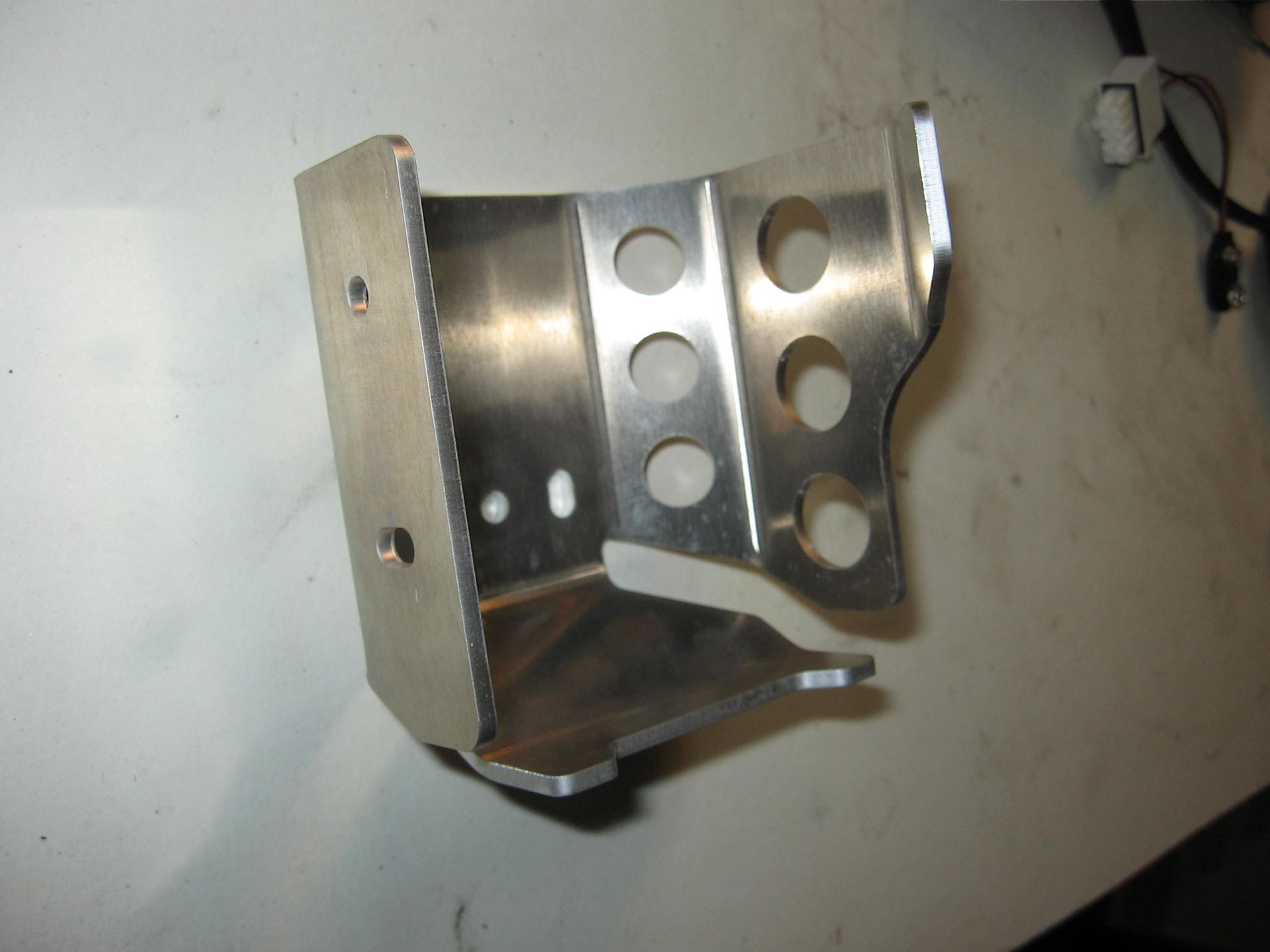 fog light shroud left hand , bevestigingskap schijnwerper tiger800				A9830031