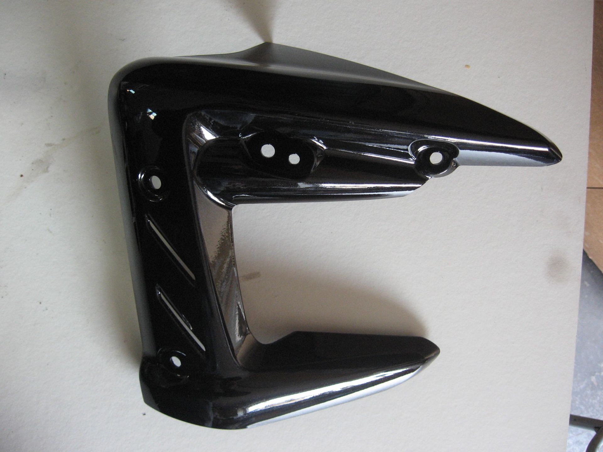 linker zijkap radiator // street triple 675 2007-2013 , street triple R 2008-2013	display model , zeer lichte schade			T2100563